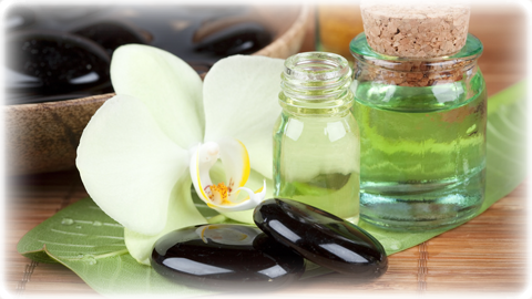Aragement von Himalajasteine und Massageoelen
